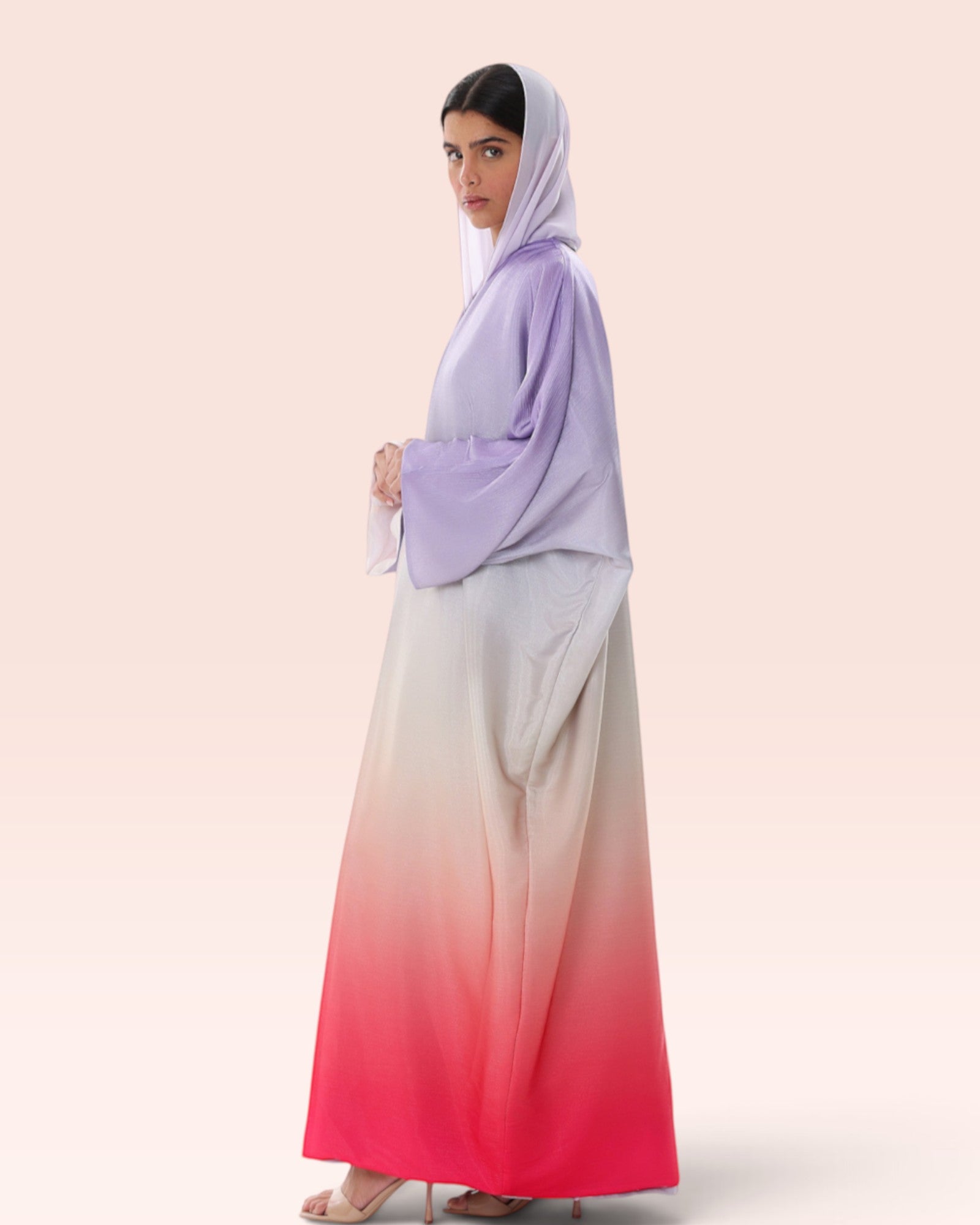 Amore Abaya Boutique Sunset Ombre Bisht Abaya in a flowy, lightweight fabric with a purple to pink gradient design.